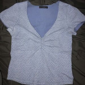 Brandy Melville blue top with white floral print